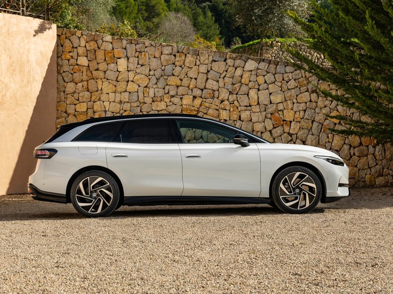 VW ID.7 concept white with black top right side view.