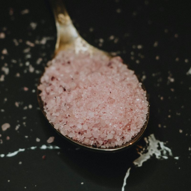 Pink salt on a spoon