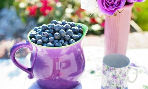 Blueberries in a purple pitcher