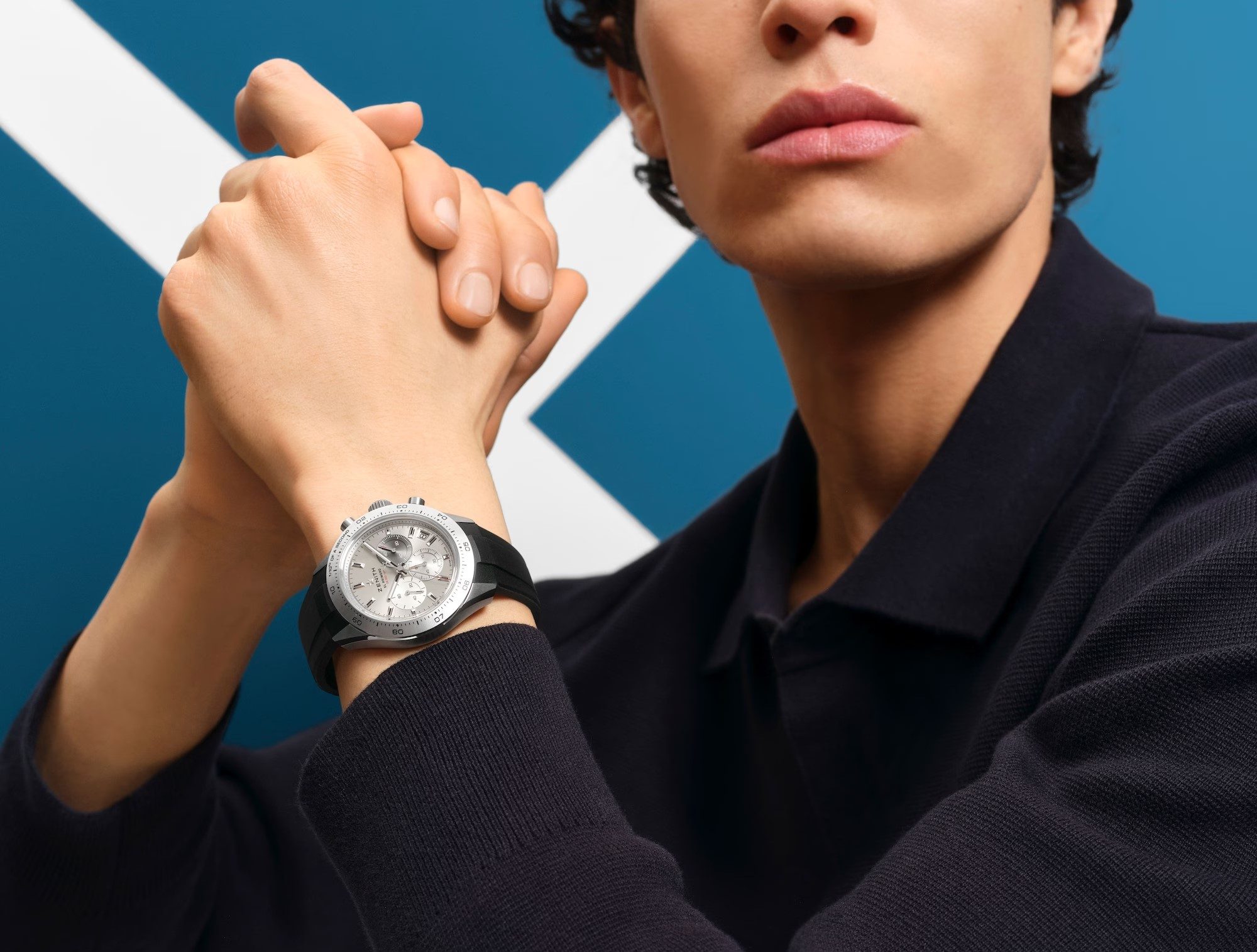 Model wearing the Zenith Chronomaster Titanium watch with rubber band.