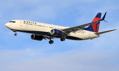 A passenger plane flying in the sky