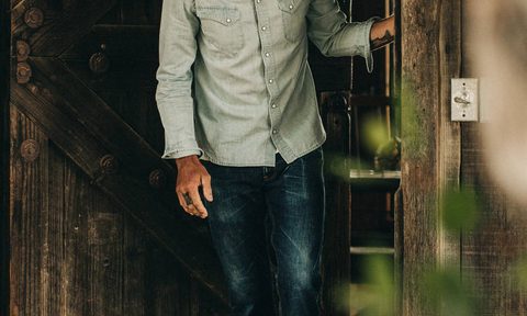 Man in Taylor Stitch The Western Shirt in Washed Denim
