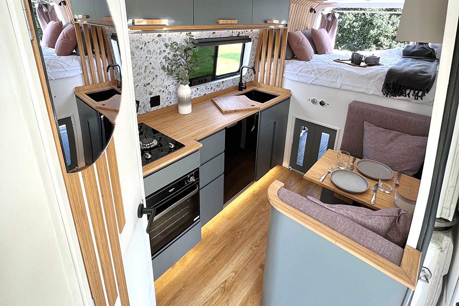Luxury vanlife build using Garnica lightweight poplar wood paneling.