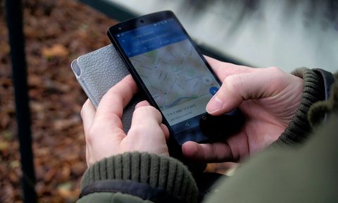 Person using Google Maps application on an Android smartphone