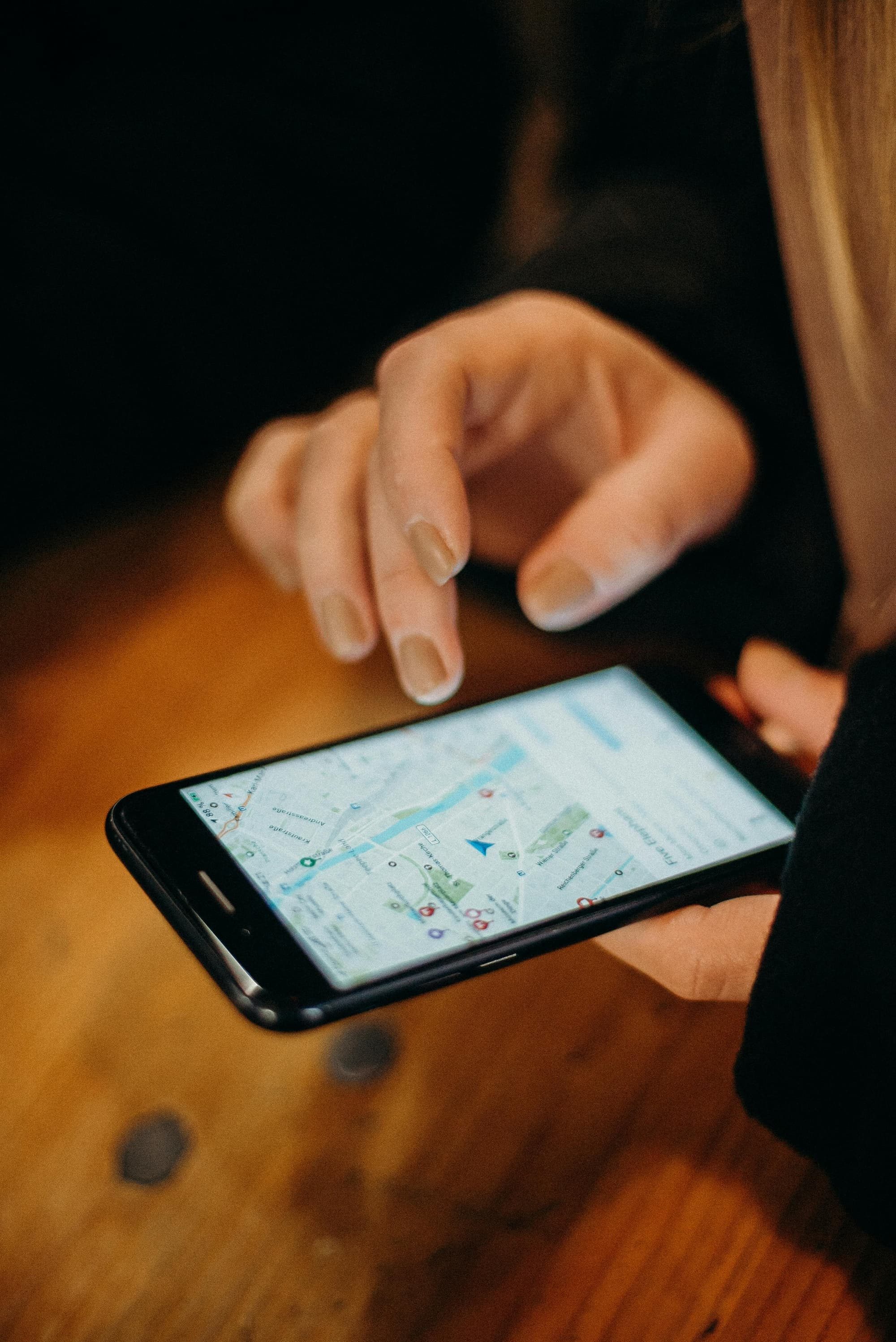 Person holding black android smartphone