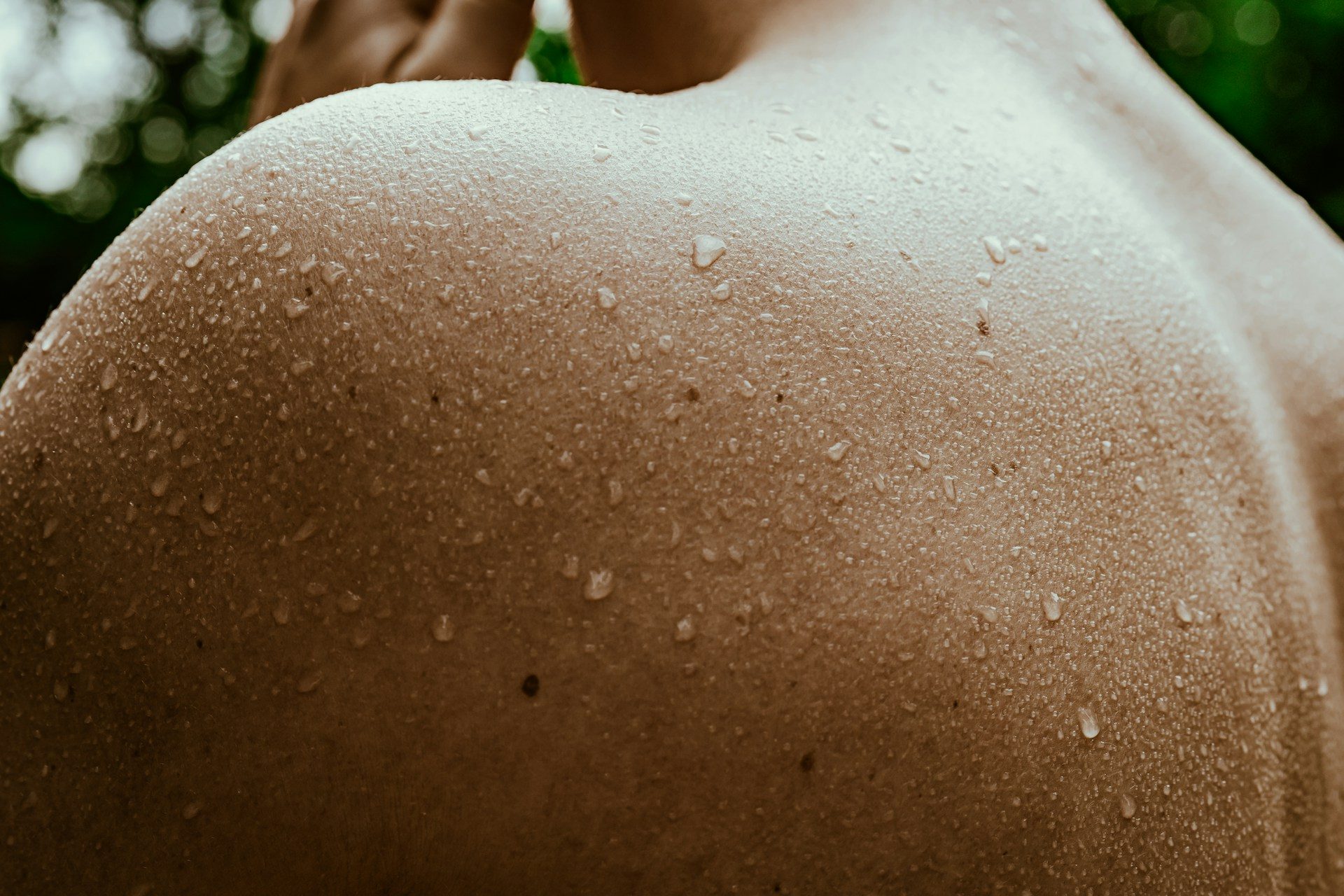 man's back with sweat