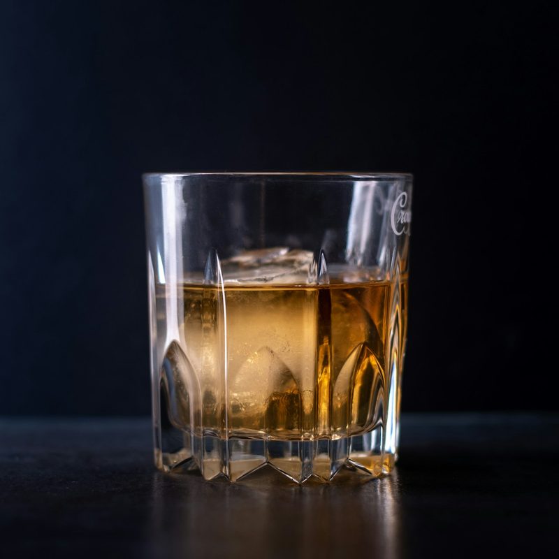 Whiskey with a dark background