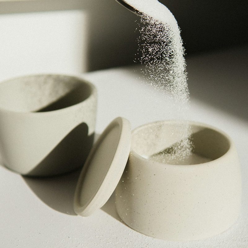 Sugar falling from a spoon