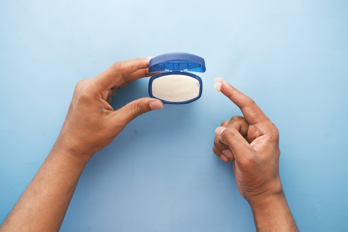 a person using petroleum jelly