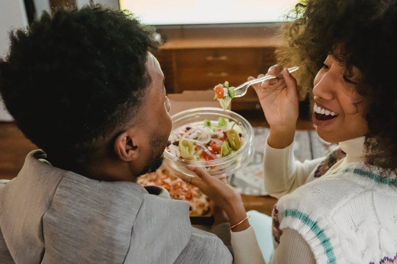Man and women sharing a meal together
