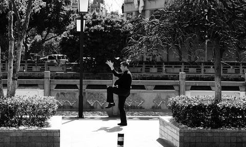 man practicing tai chi