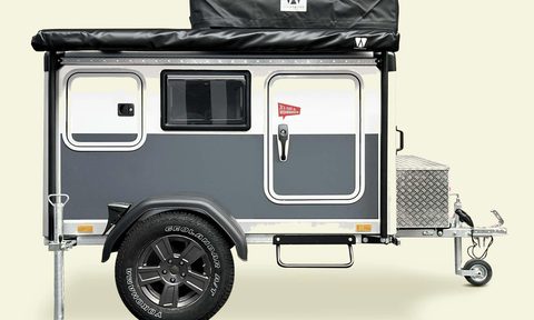 Sportcaravan Cube 1 Microcarvan Travel Trailer isolated on a studio background.