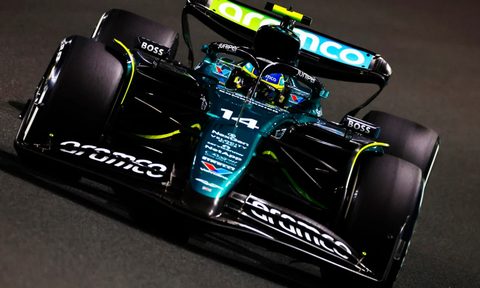 Aston Martin Formula 1 race car driving directly toward the camera.