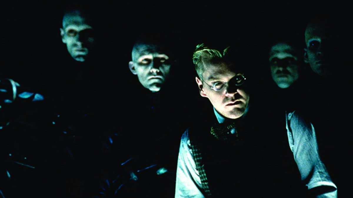 Kiefer Sutherland and some disturbing figures in Dark City.