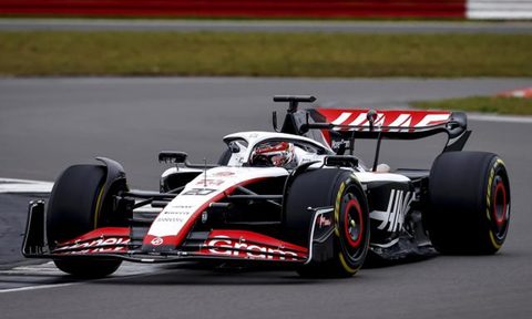 Haas F1 team Formula 1 race car on the track.