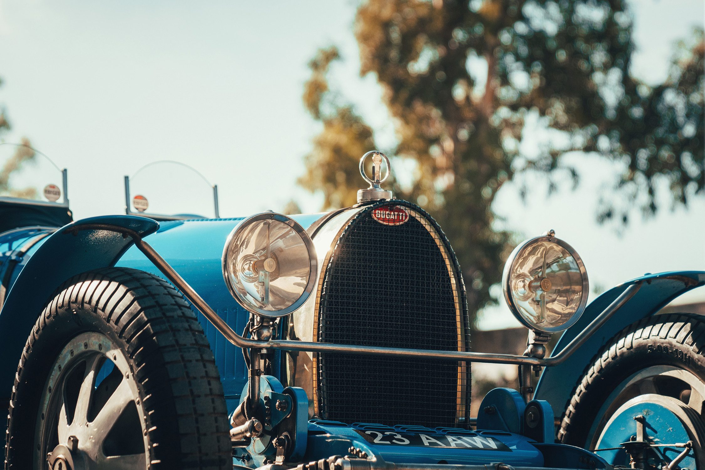 Headlights, radiator, and proud front of a Bugatti Type 35.