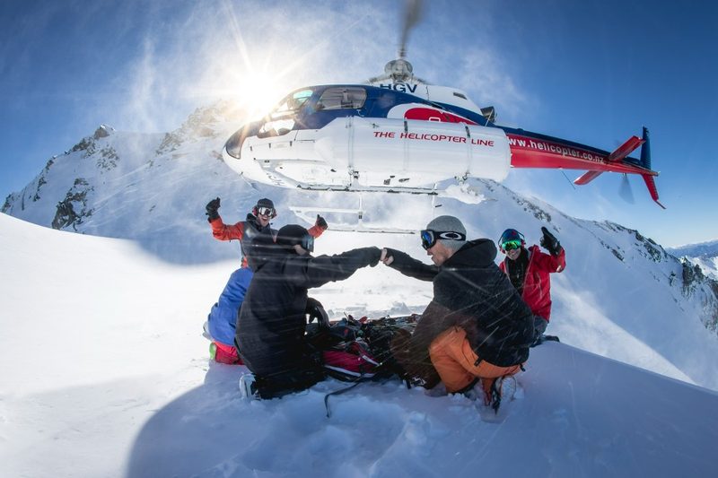 People heli-skiing in New Zealand