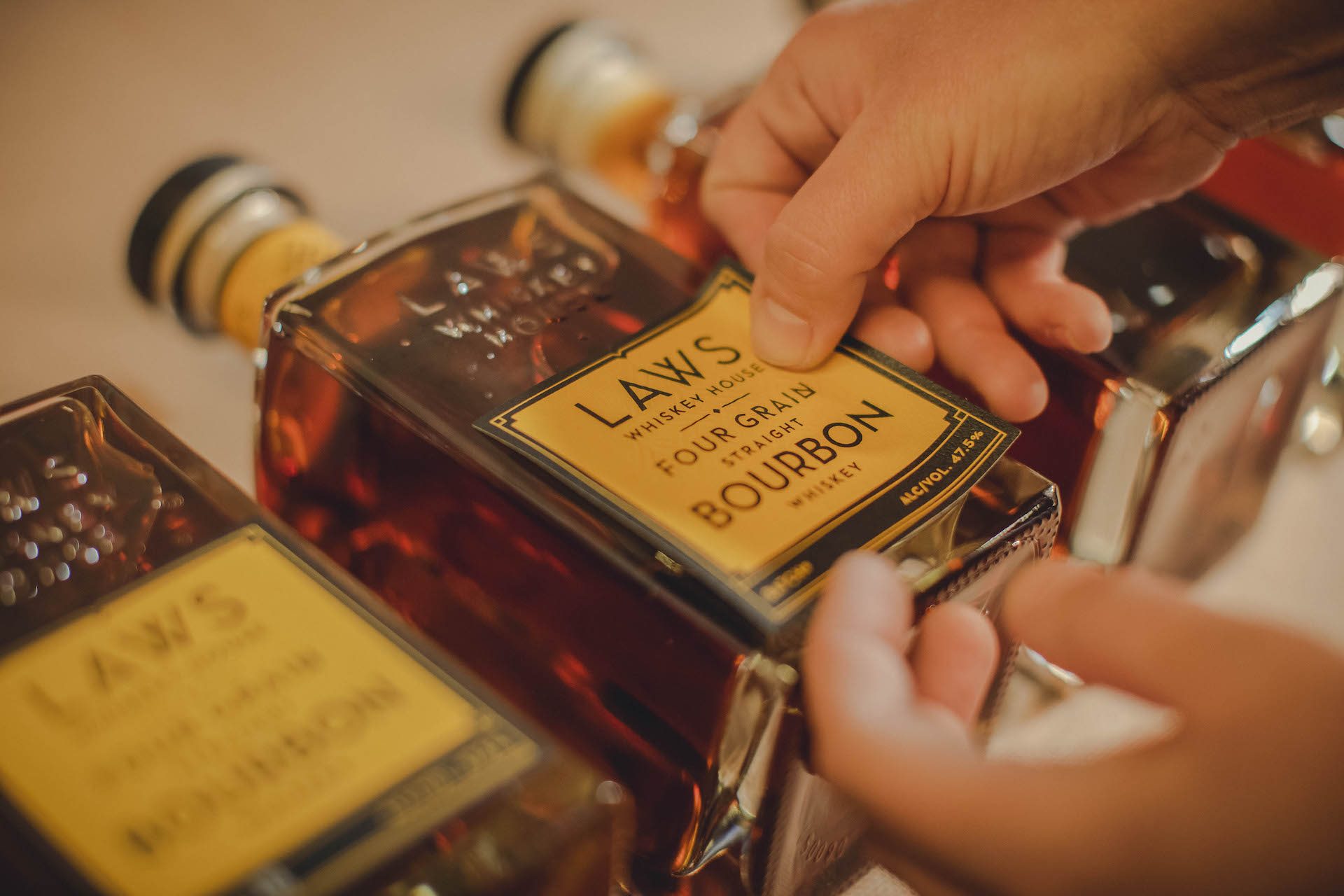 Laws Whiskey bottles