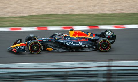 Max Verstappen driving a Red Bull F1 race car.