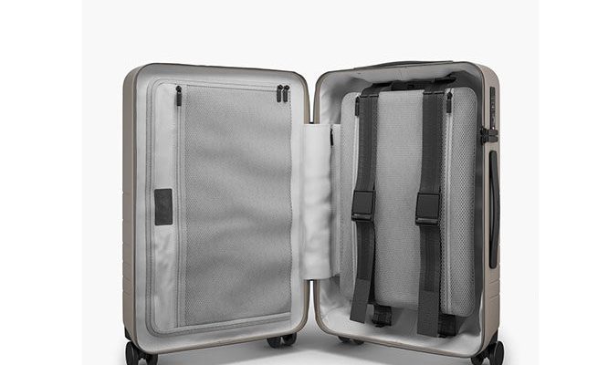 Monos luggage on a white background.