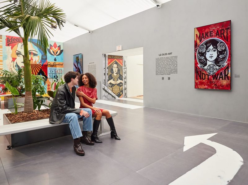 Shepard Fairey X LG OLED Art make art not war canvas on wall at Frieze LA 2024 another gallery perspective.