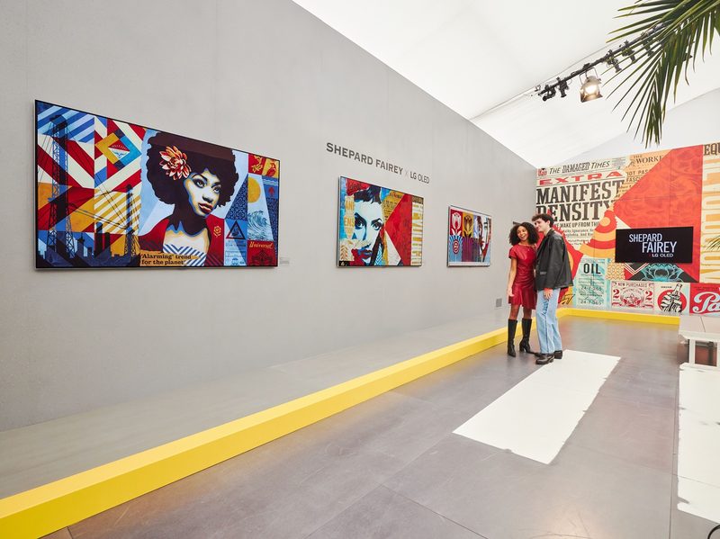 Shepard Fairey artwork X LG OLED Art on display at Frieze LA 2024 with visitors in the gallery.
