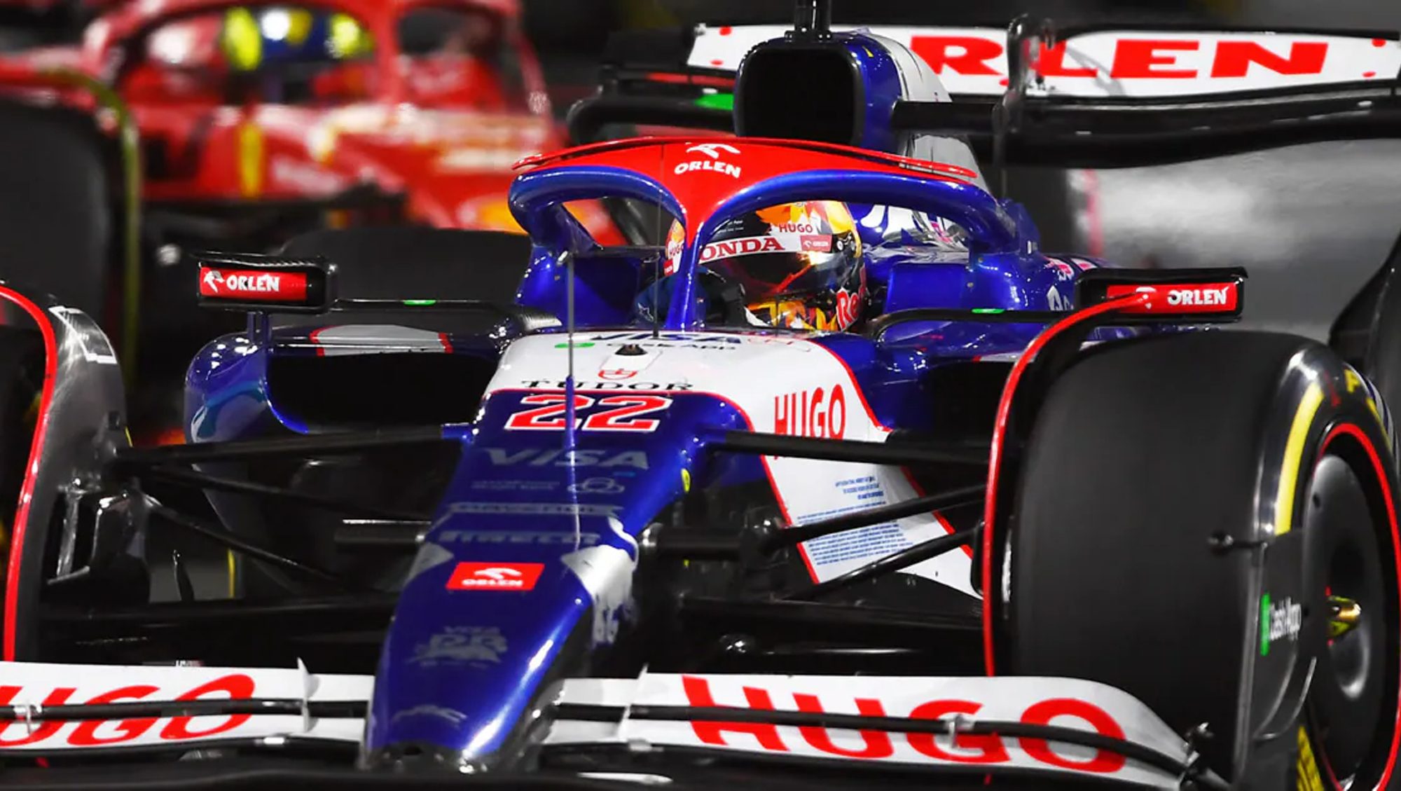 Visa Cash App RB Formula 1 team car on the track.