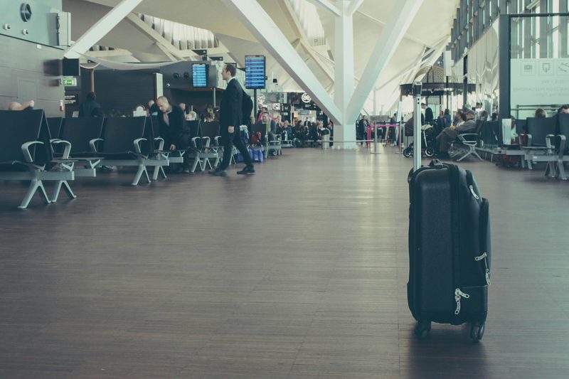 airport terminal with roller bag