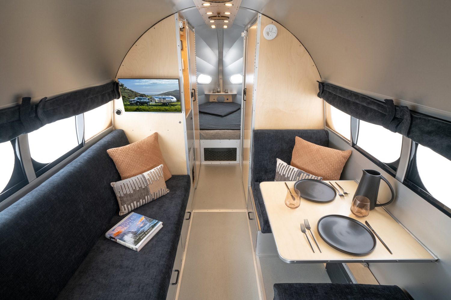 Sleek interior of the Bowlus Rivet travel trailer.