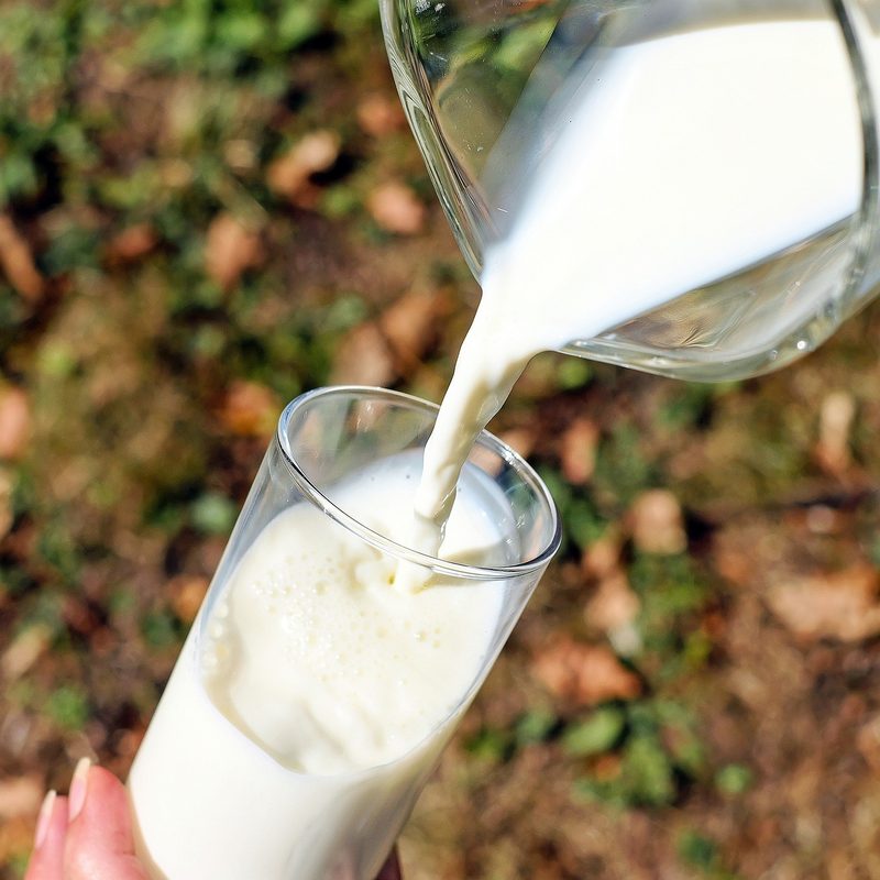 Milk being poured into a glass