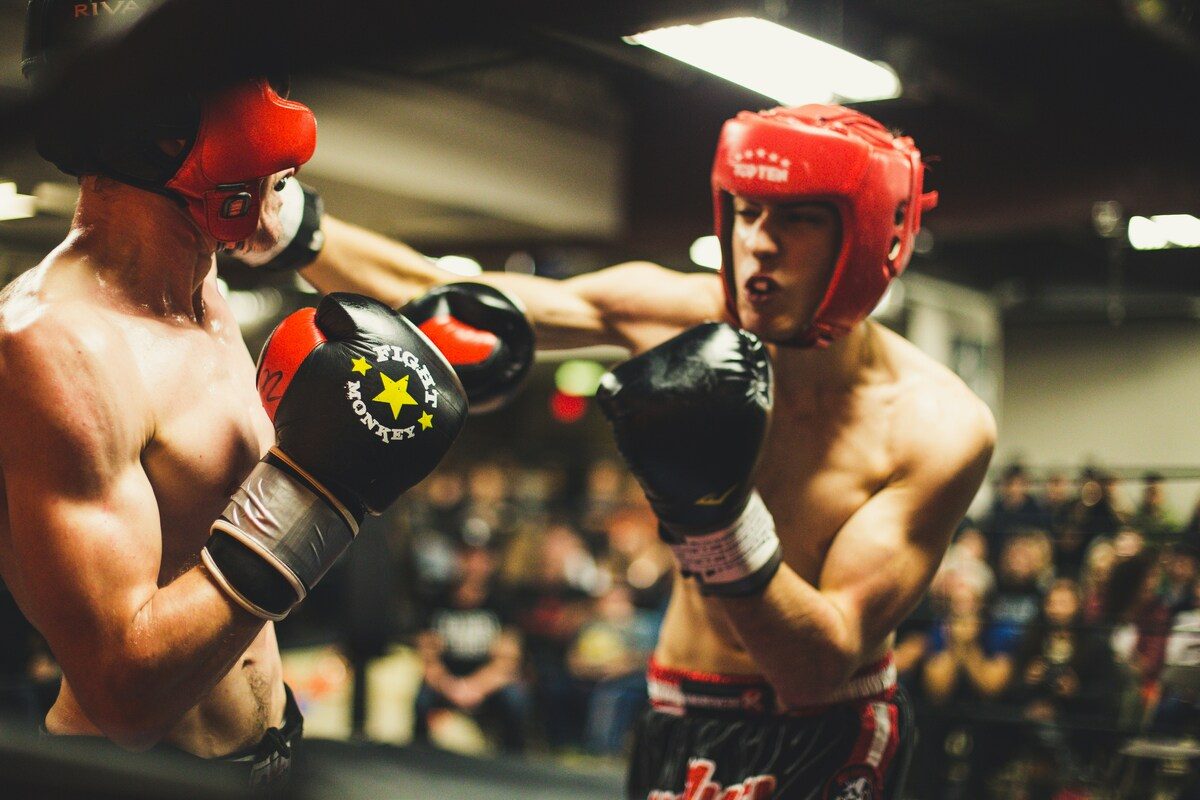 Two men boxing.