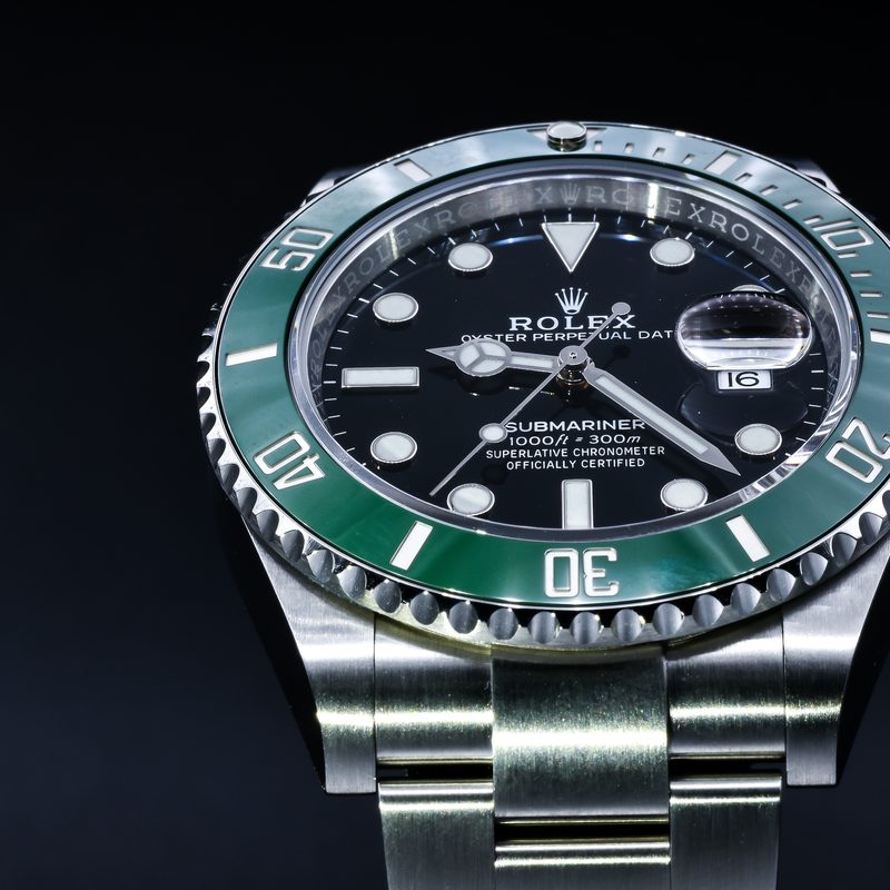 the photo was took in Bangkok on 26 April 2021. The purpose is to demonstrate the Rolex watch Ref 126610lv or known as starbuck is the submarine model with black dial and green ceramic bezel.