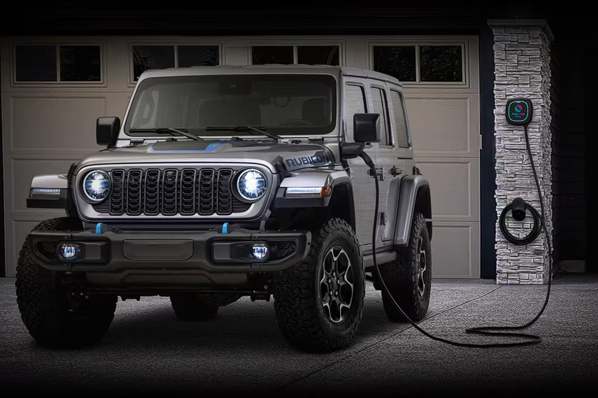 electric jeep wrangler 2024 4xe plugged in to a home fast charger between the doors of 2 car garage