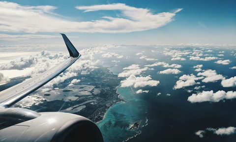 View over airplane wing in Bahamas