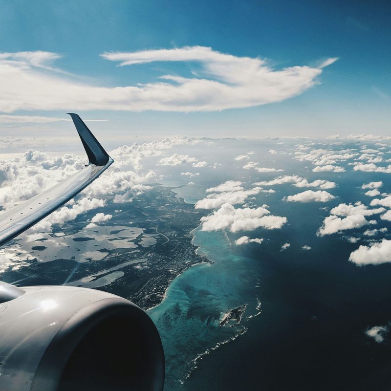 View over airplane wing in Bahamas