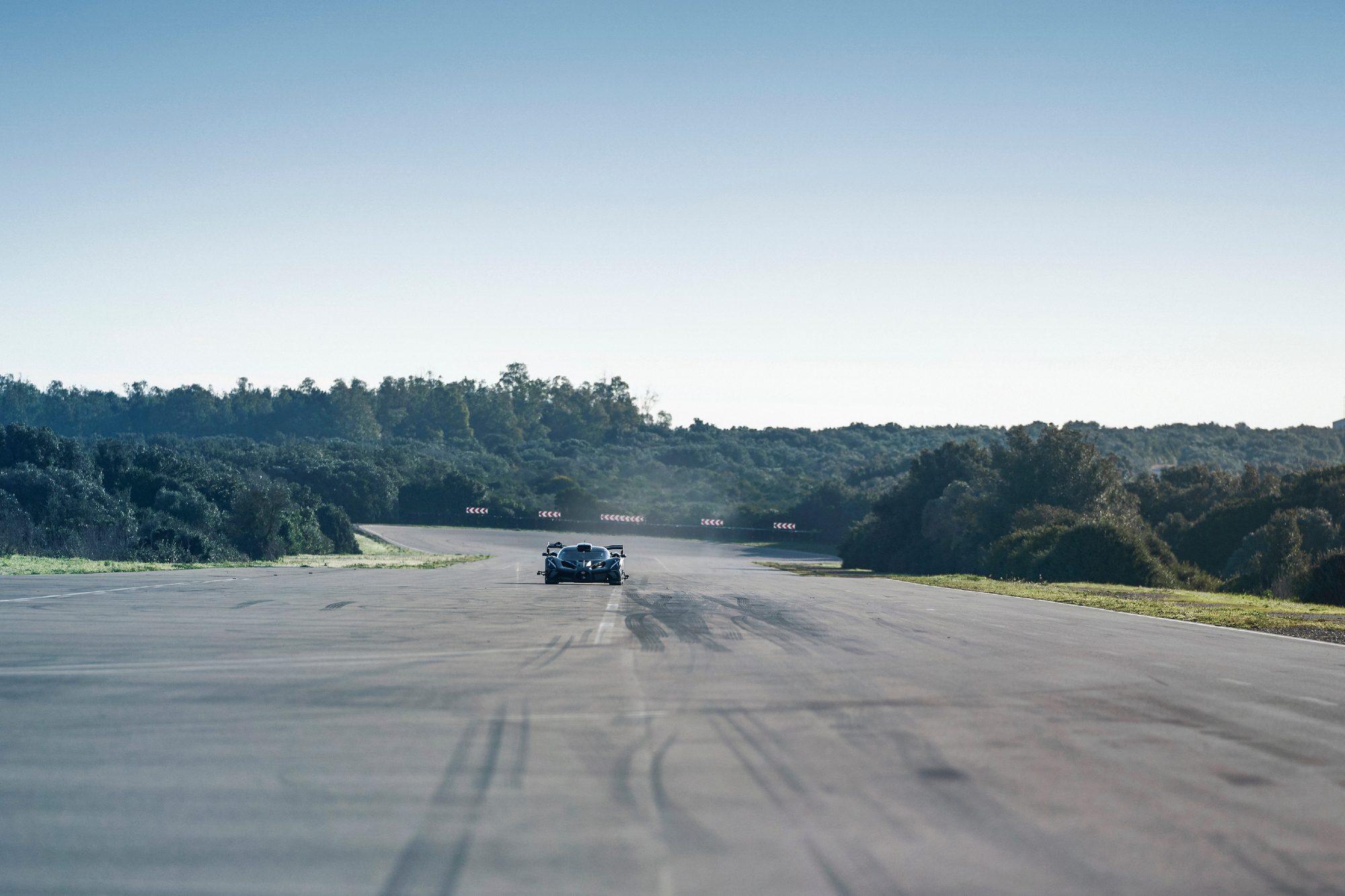 BUGATTI Bolide High Speed and Launch Control driving toward camera from a distance on a high scpeed run in the middle of the track.