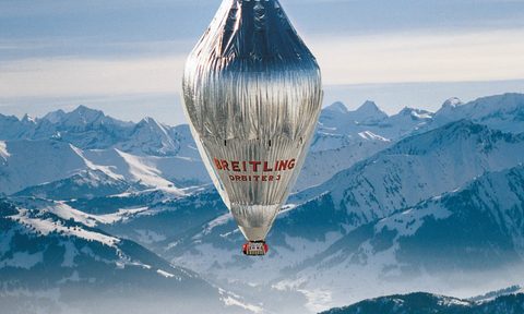 Breitling balloon over mountains