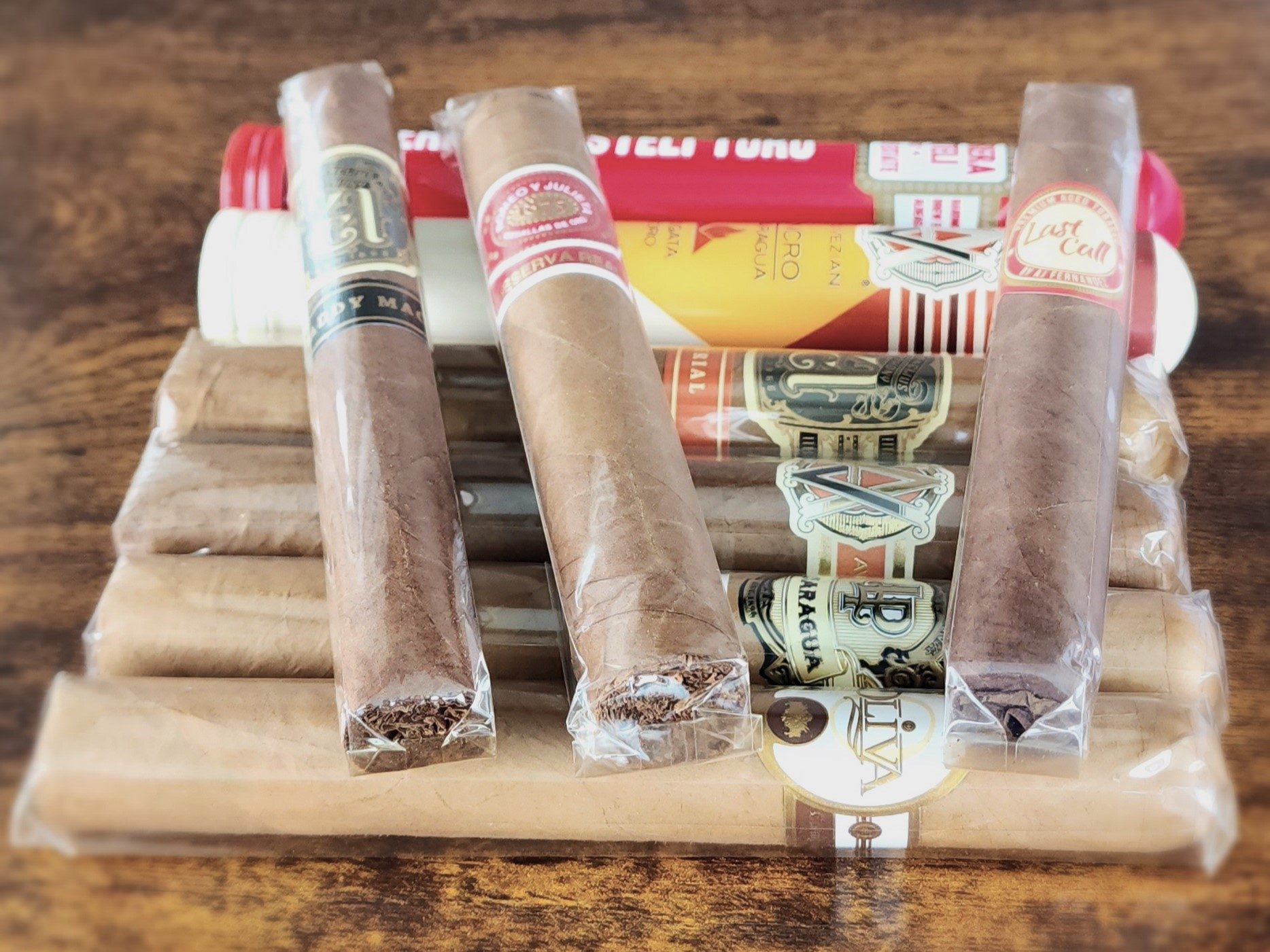 Bundle of cigars on the table from Briley Kenney | The Manual.