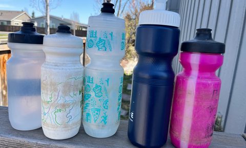 Several mountain biking water bottles