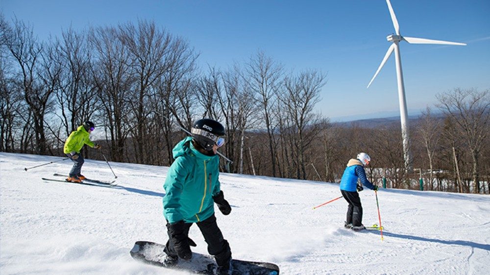 Skiers and snowboarder at Jiminy Peak