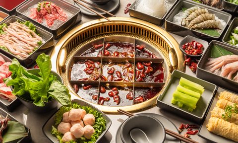 nine-grid hot pot with ingredients.
