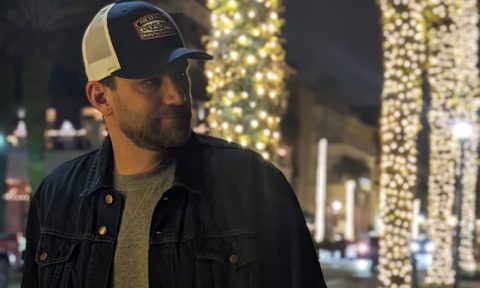 Man in hat and jacket