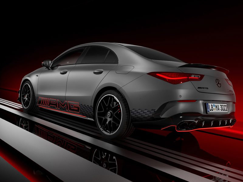 Mercedes-AMG CLA 45 S Edition 1 sedan parked on dark gray staging with a gradiant red background left rear three quarter view,