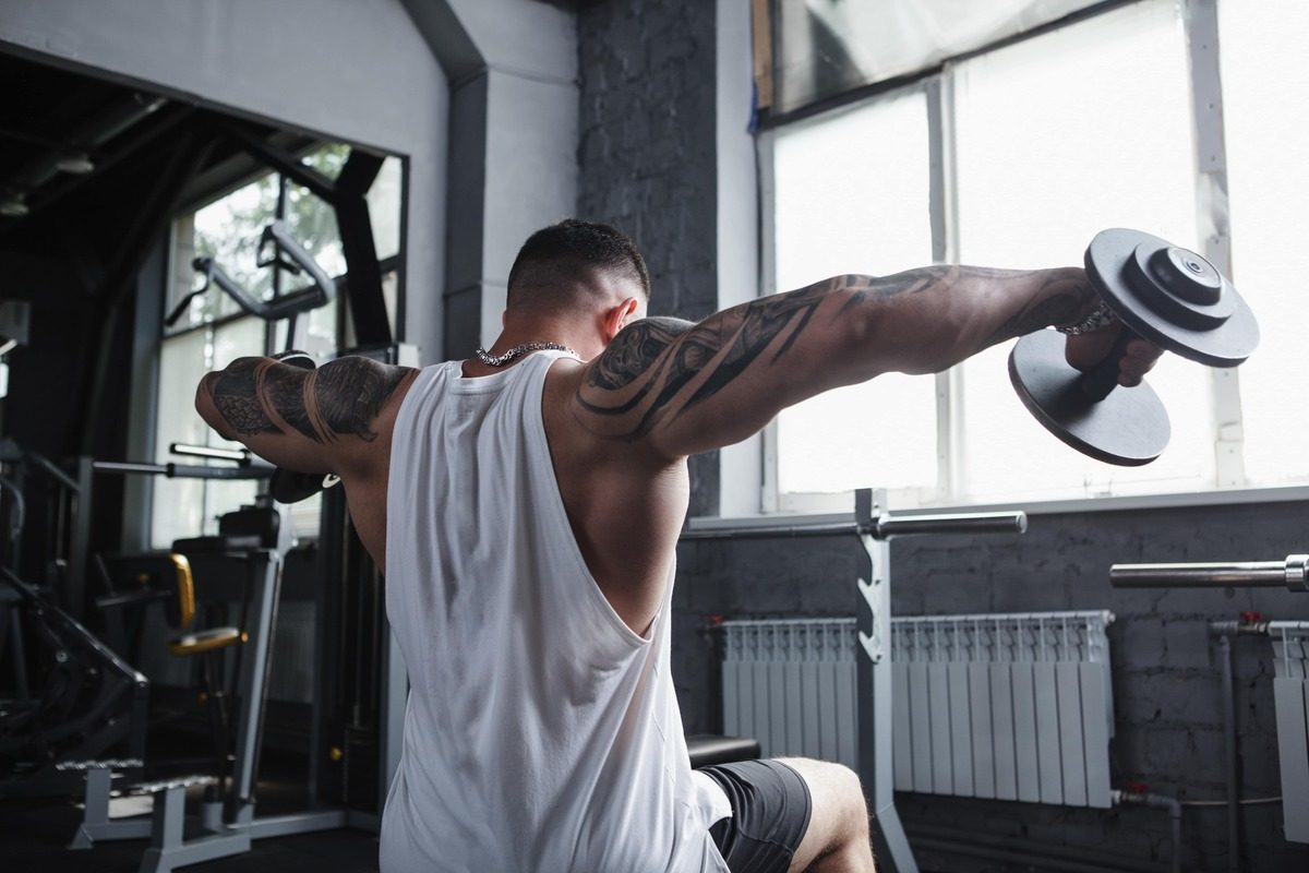 Man doing lateral raises.