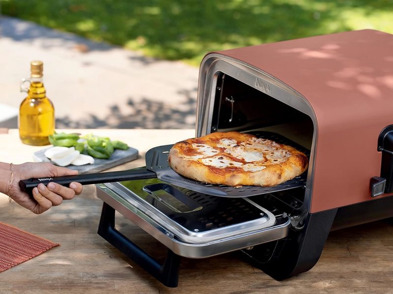 Cooking pizza on the Ninja Woodfire Outdoor Oven.