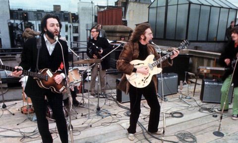 The Beatles perform their rooftop concert in 1970.