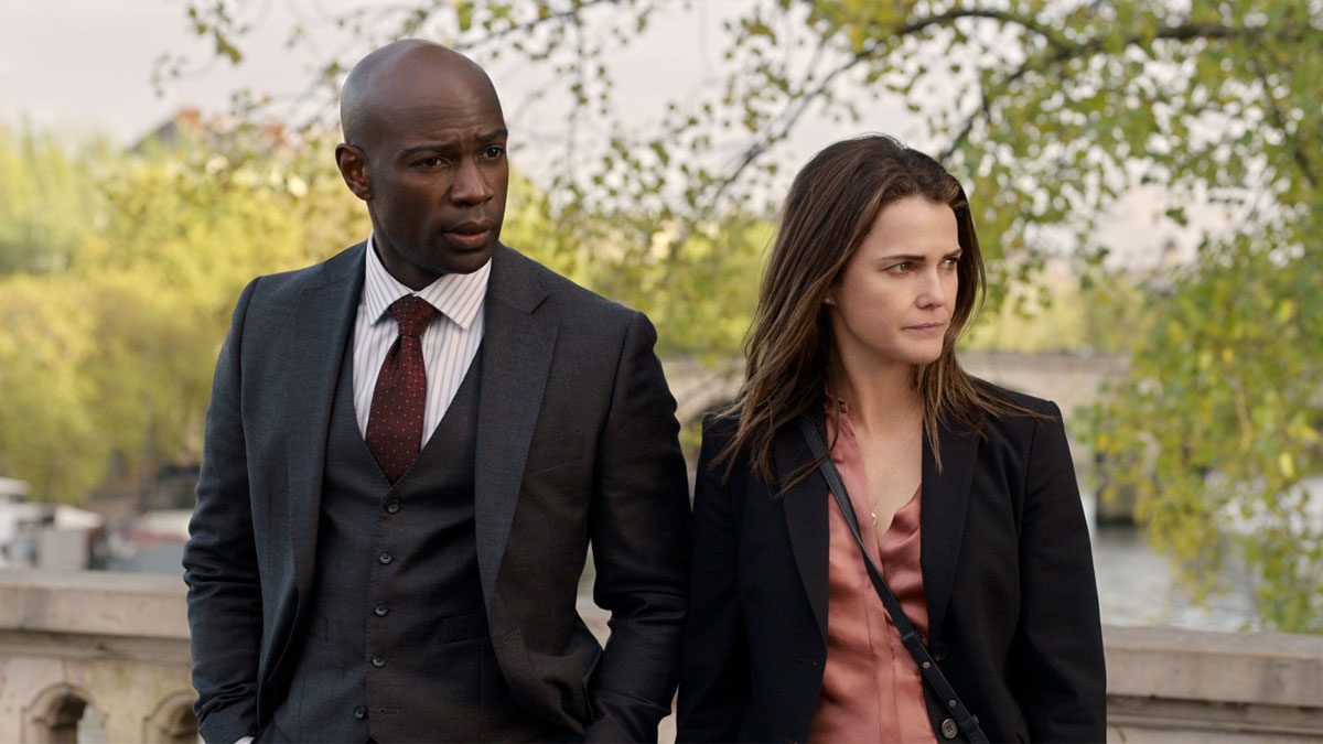 David Gyasi and Keri Russell in The Diplomat.