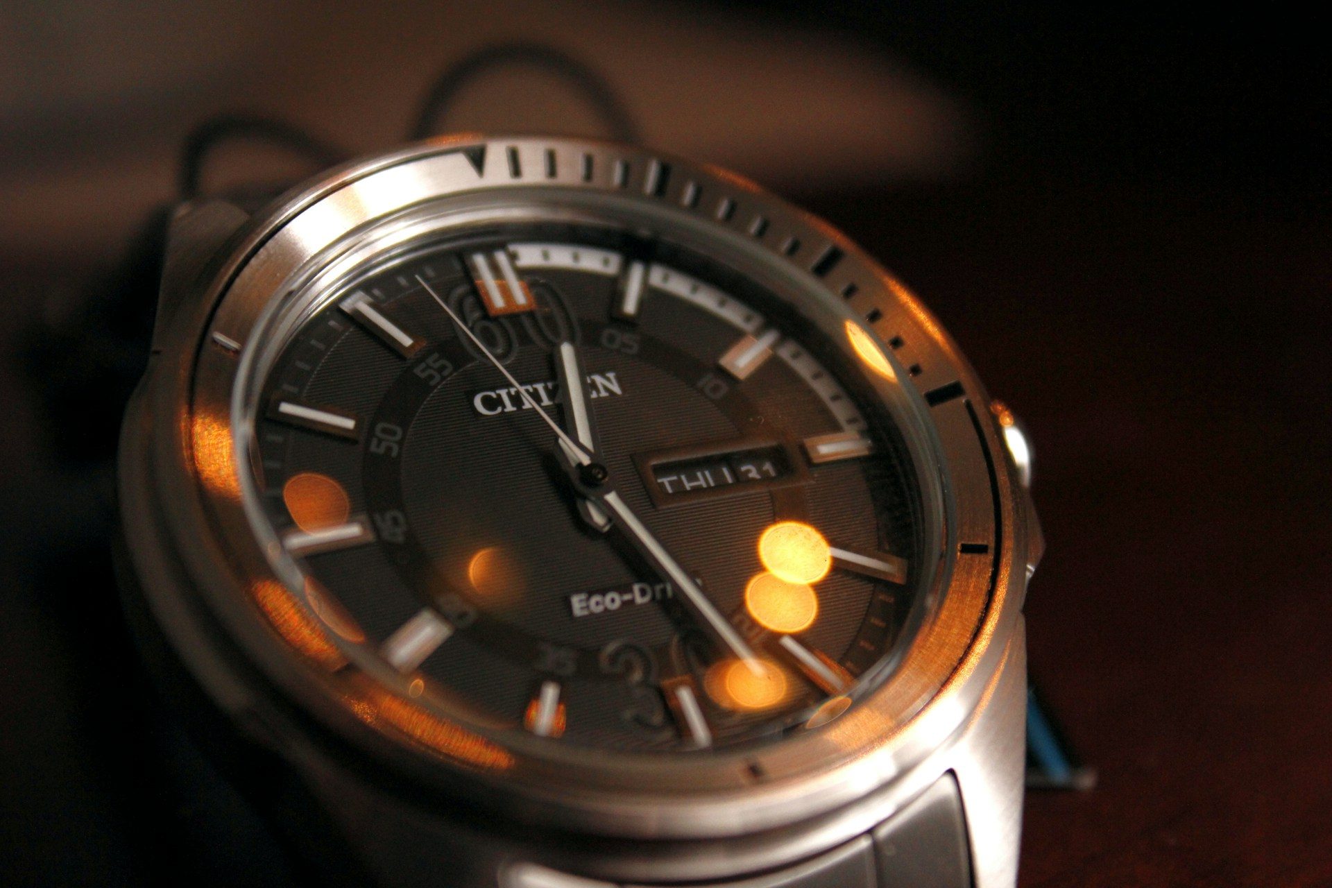grey and silver Citizen watch closeup