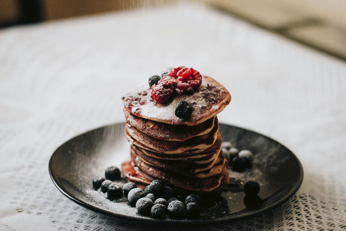 a tall stack of pancakes