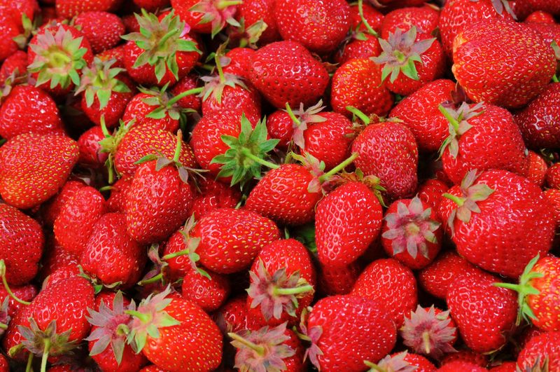 Small strawberries in container
